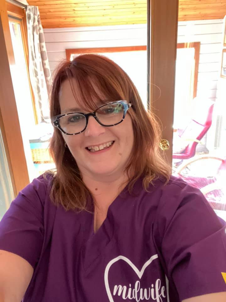 Carrie Sizer Midwife Purple Scrubs